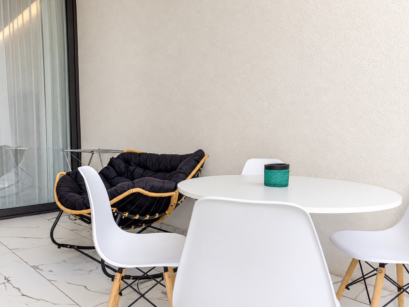 Private balcony with table and chairs